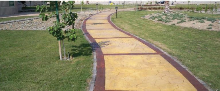 Stamped concrete path in a green area